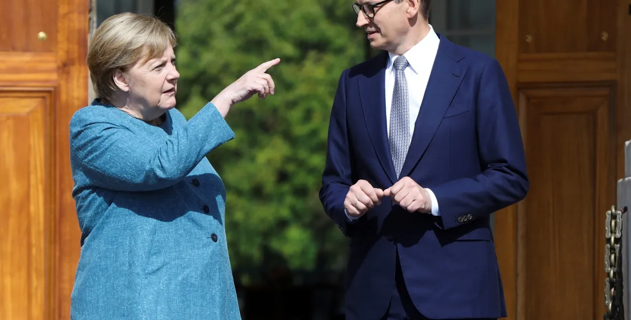 Ангела Меркель с польским премьером Матеушем Моравецким. Варшава, 11 сентября 2021 года / Reuters