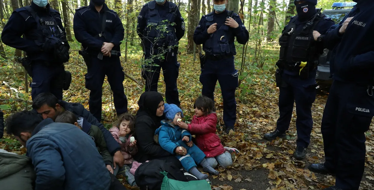 Мигранты на польско-белорусской границе / Reuters