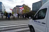 Protesters with Belarusian white-red-white national flags at a square in Brussels on 23&nbsp;November 2017. Photo: Zmitser Lukashuk