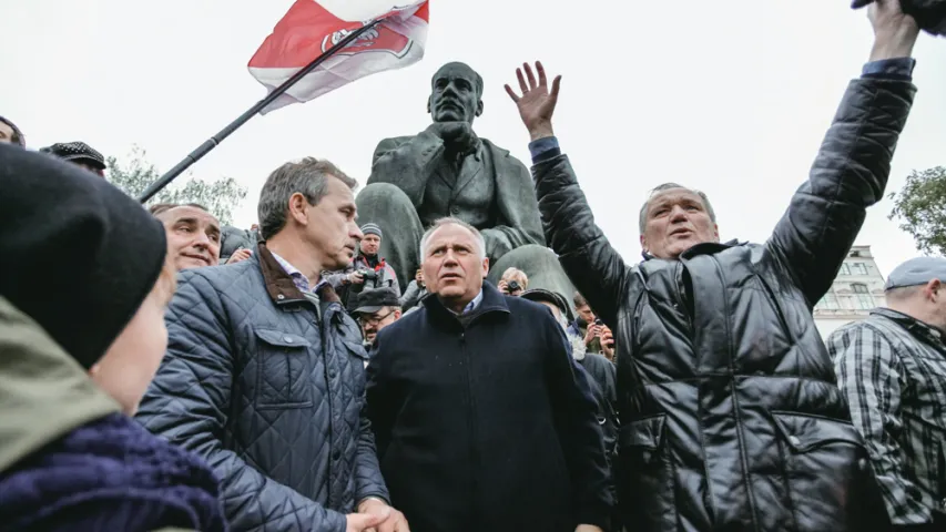 Фотарэпартаж з мінскай акцыі "Шэсце нацыянальнага сцяга"